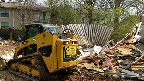 skid steer demo|garage skid steer demo.